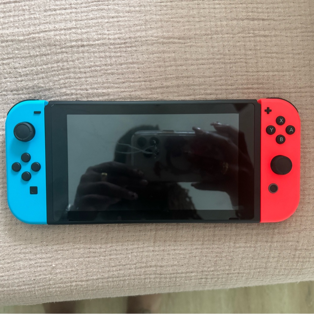 Nintendo Switch with Neon Blue Left & Neon Red Right Joy‑Con